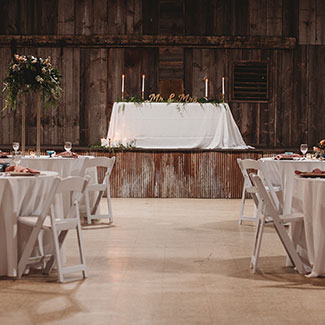Elegantly decorated wedding banquet tables at The Venue in Kaukauna WI.